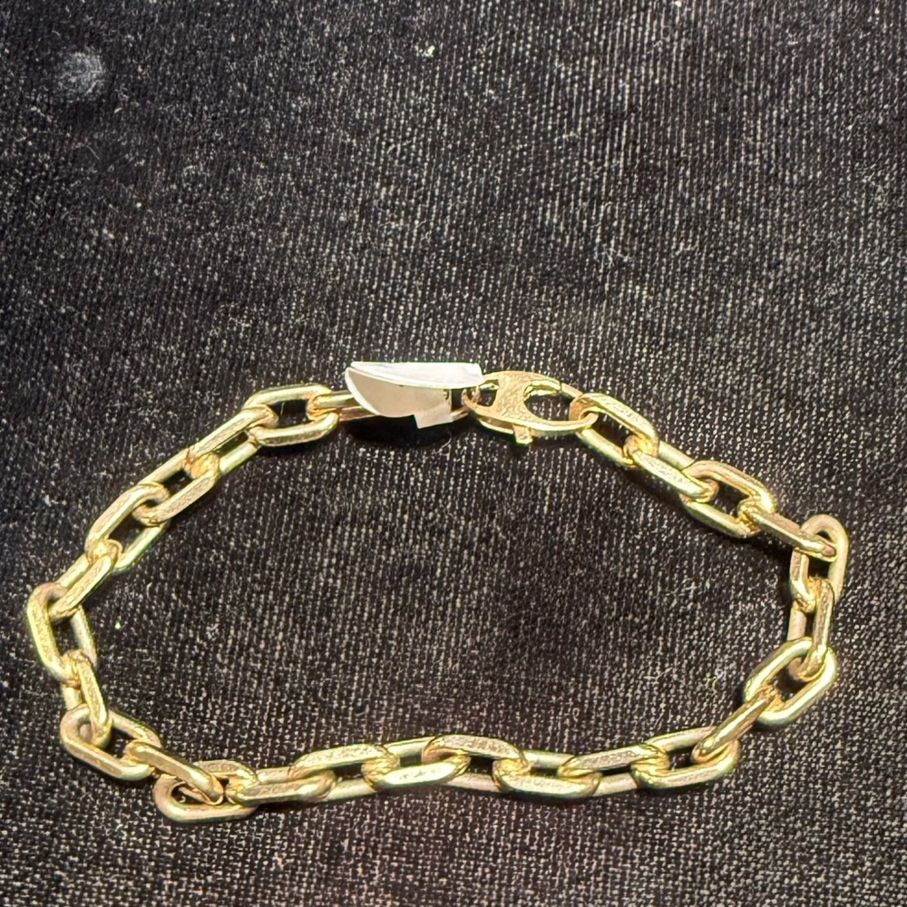 14k gold bracelet weighing 16.48 grams. 7.75” in length
